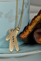 Gingerbread baby pendant gold - NecklacesChristine Sadler