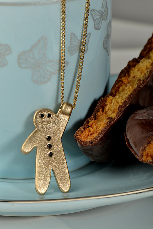 cute Gingerbread pendant in gold with black diamonds for buttons - Christine Sadler