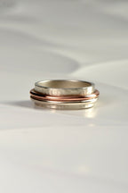 Handmade hammered silver and rose gold ring for a man from contemporary jewellery desginer Christine Sadler