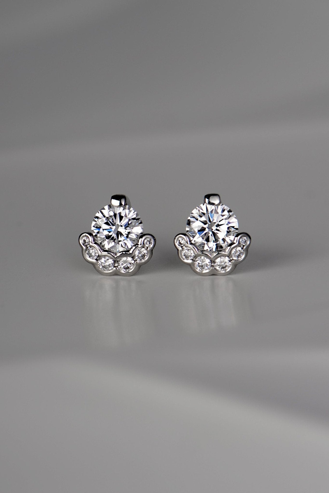 Exclusive designer Platinum Diamond stud earrings that are really different and special, inspired by the Scottish fairy pools