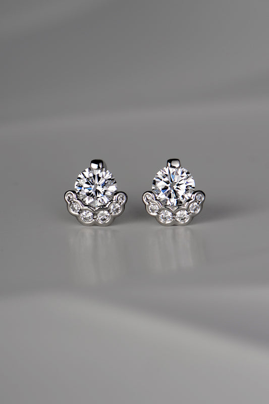 Exclusive designer Platinum Diamond stud earrings that are really different and special, inspired by the Scottish fairy pools