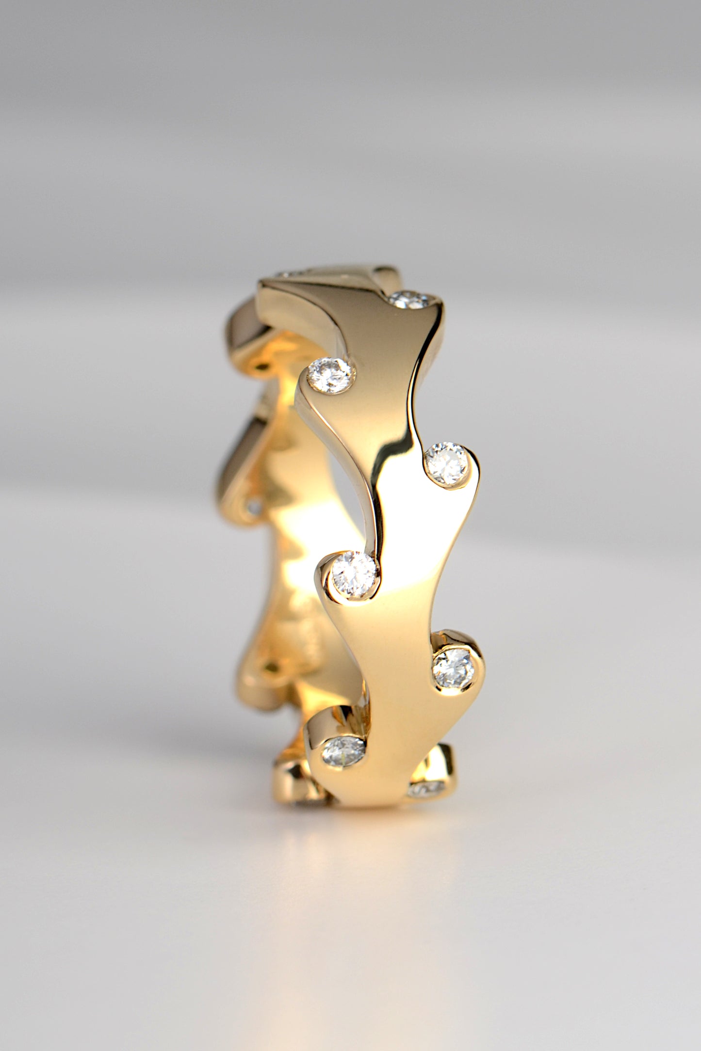 very special and unusual diamond ring in 18ct yellow gold for a woman designed in Scotland by Christine Sadler