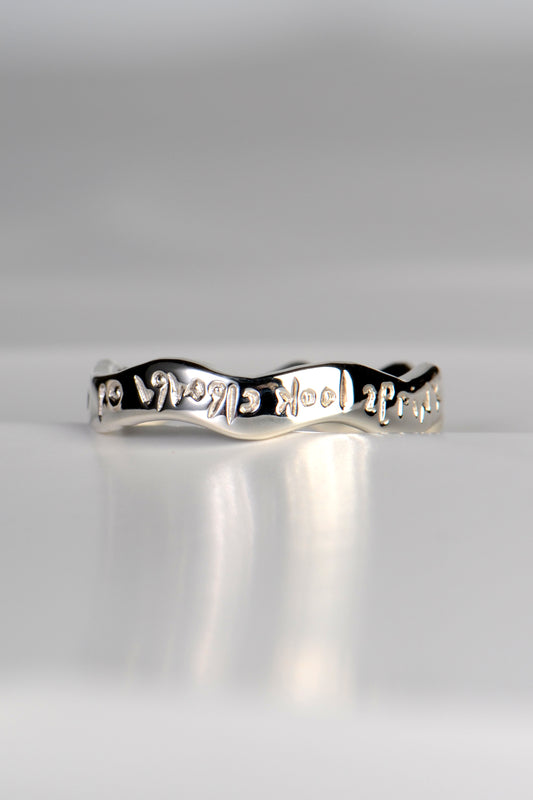 silver designer ring with a hidden engraved message from Christine Sadler