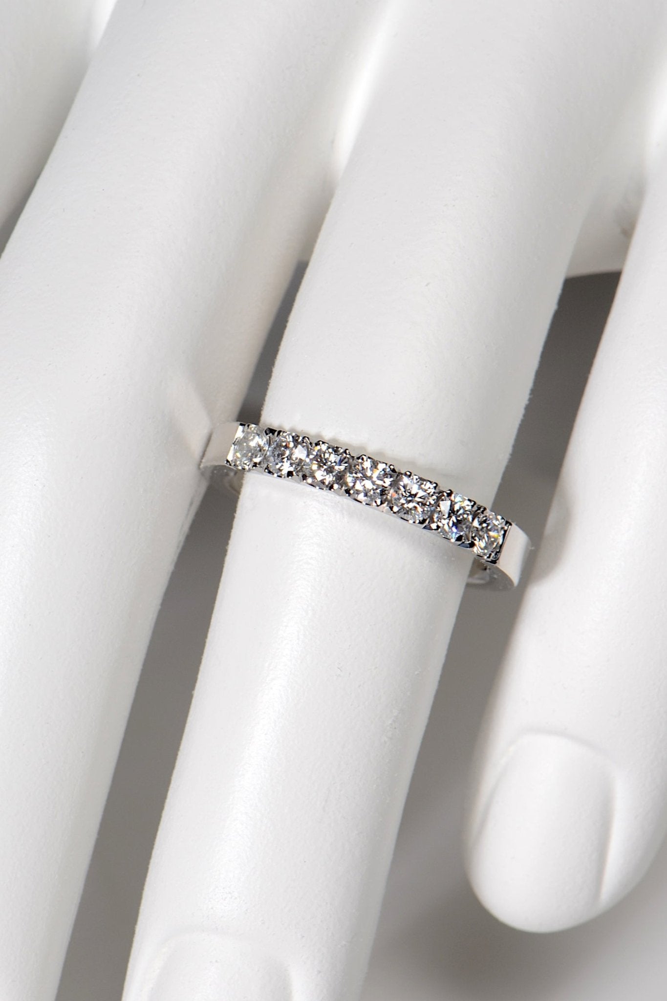 stunning high quality castle set diamond and platinum wedding ring handmade in the UK