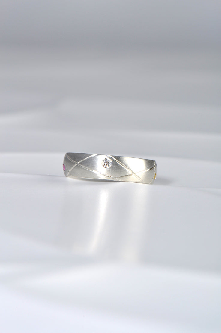 modern brushed silver ring set with a diamond from Christine Sadler's Afternoon Tea collection of jewellery
