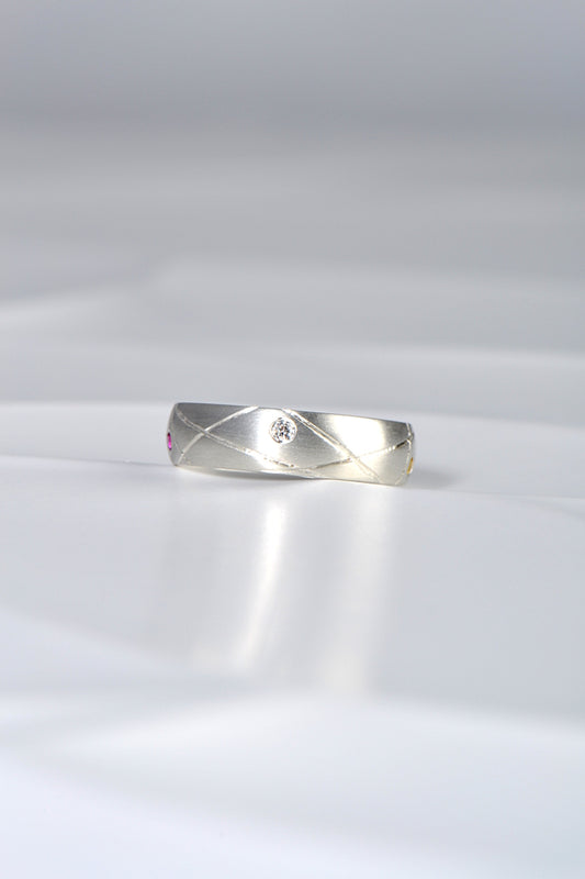 modern brushed silver ring set with a diamond from Christine Sadler's Afternoon Tea collection of jewellery