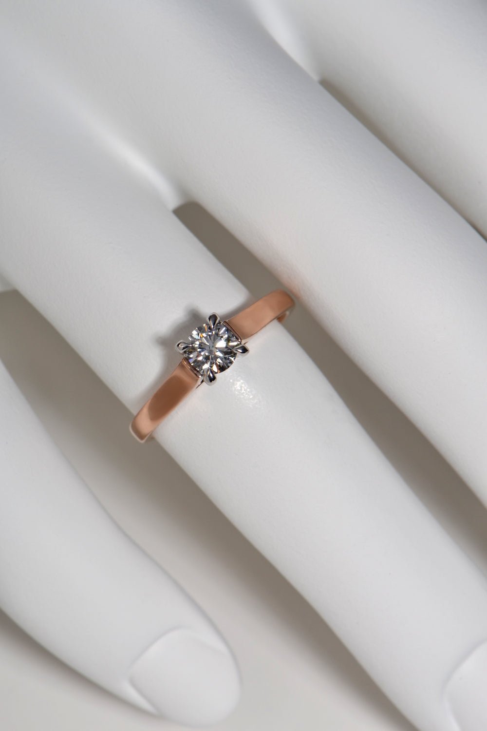 affordable solitaire engagement ring made in the UK rose gold moissanite