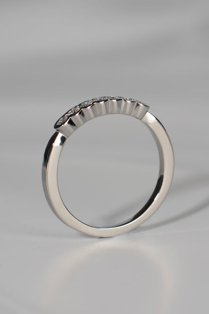 modern platinum and diamond narrow wedding ring for a woman
