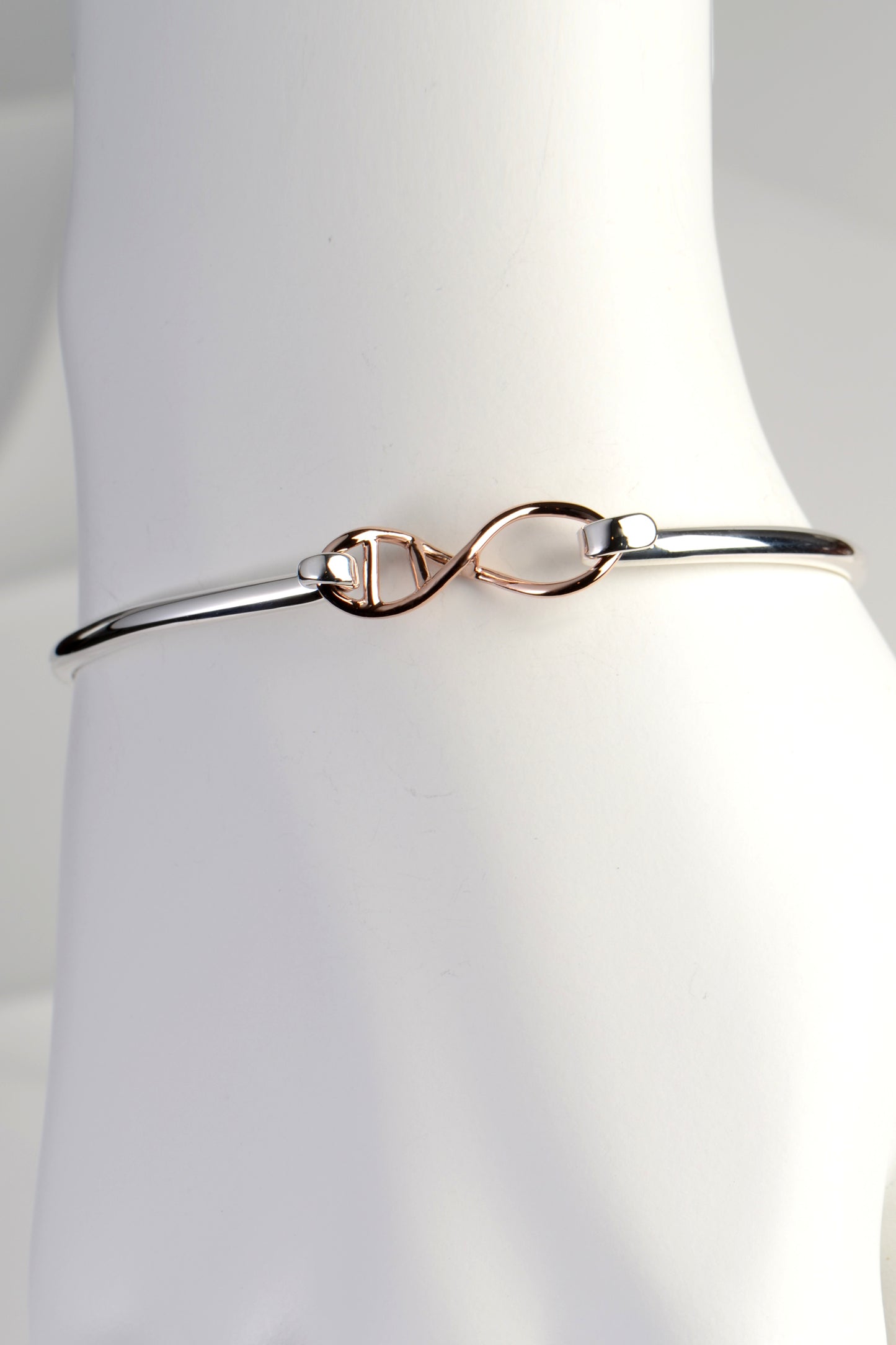 Designer genes silver and rose gold bangle