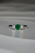 square cut emerald three stone ring with princess cut diamonds one of a kind