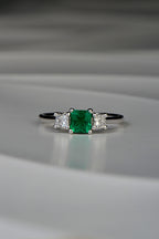 square cut emerald three stone ring with princess cut diamonds one of a kind
