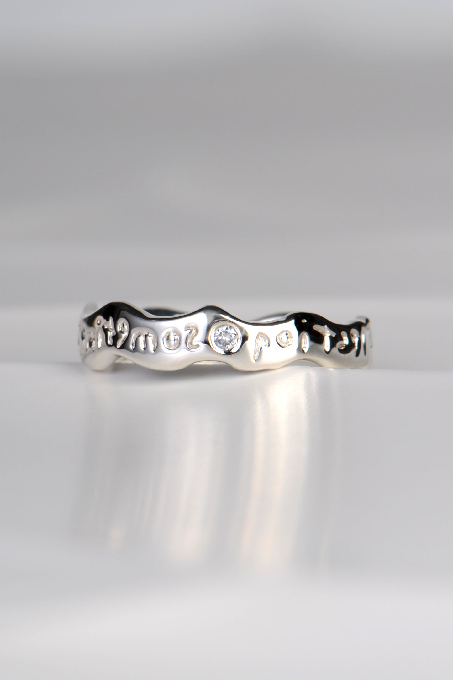 secret designer ring with a hidden message set with a diamond by Christine Sadler