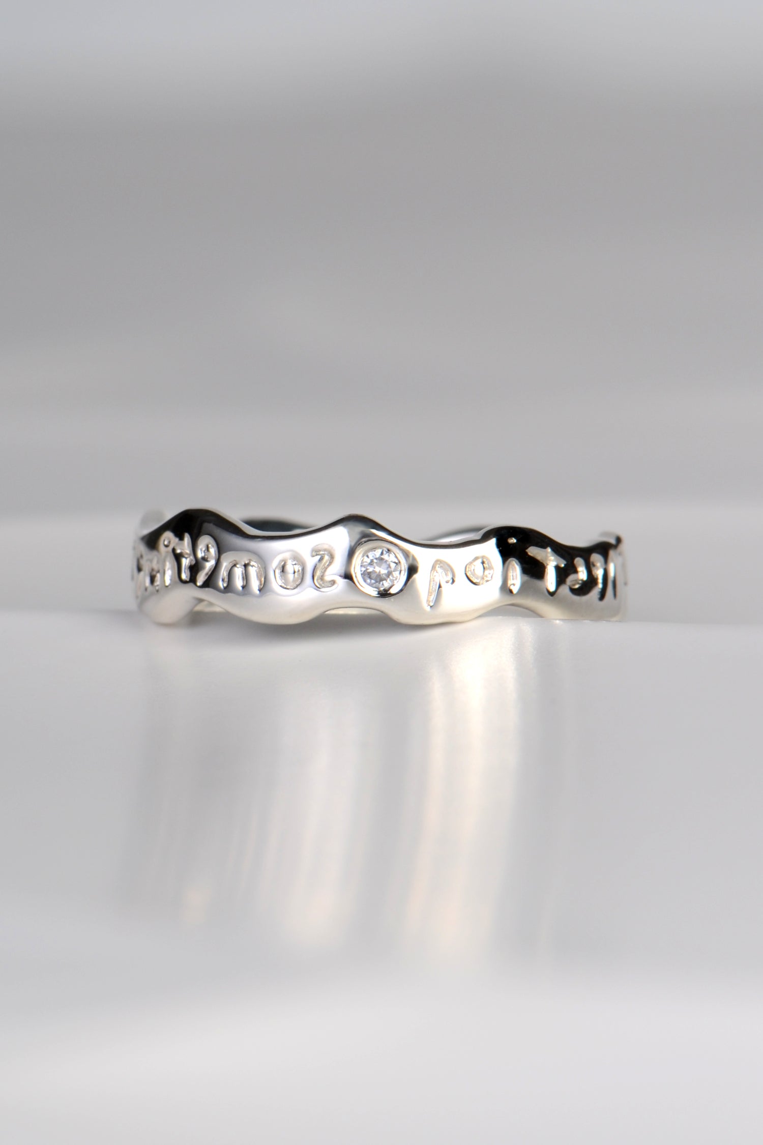 secret designer ring with a hidden message set with a diamond by Christine Sadler
