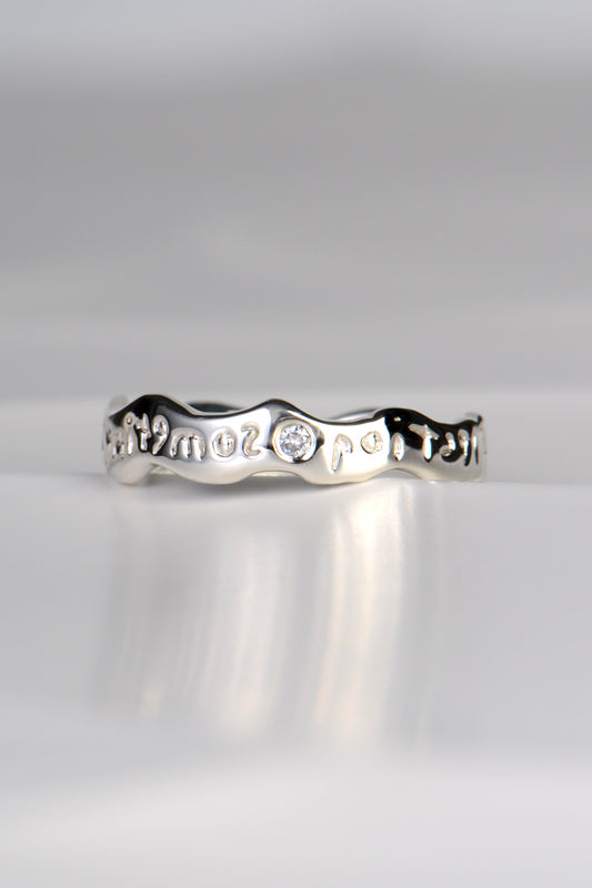 secret designer ring with a hidden message set with a diamond by Christine Sadler