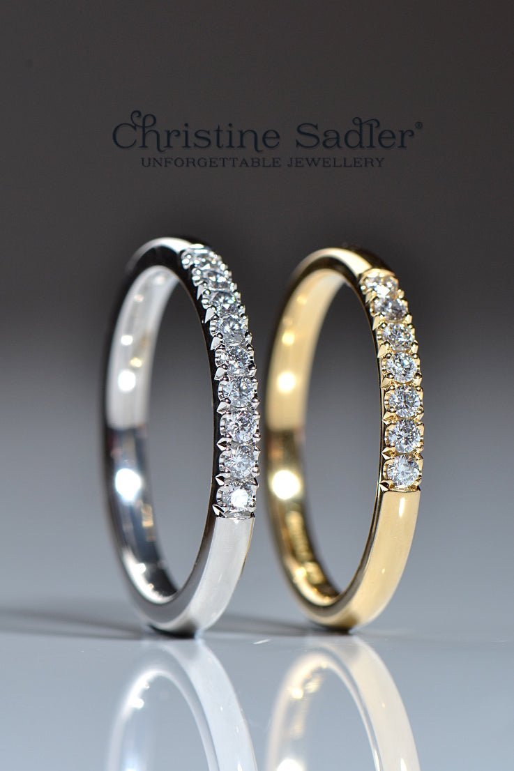 Castle set diamond wedding or eternity rings in platinum and gold