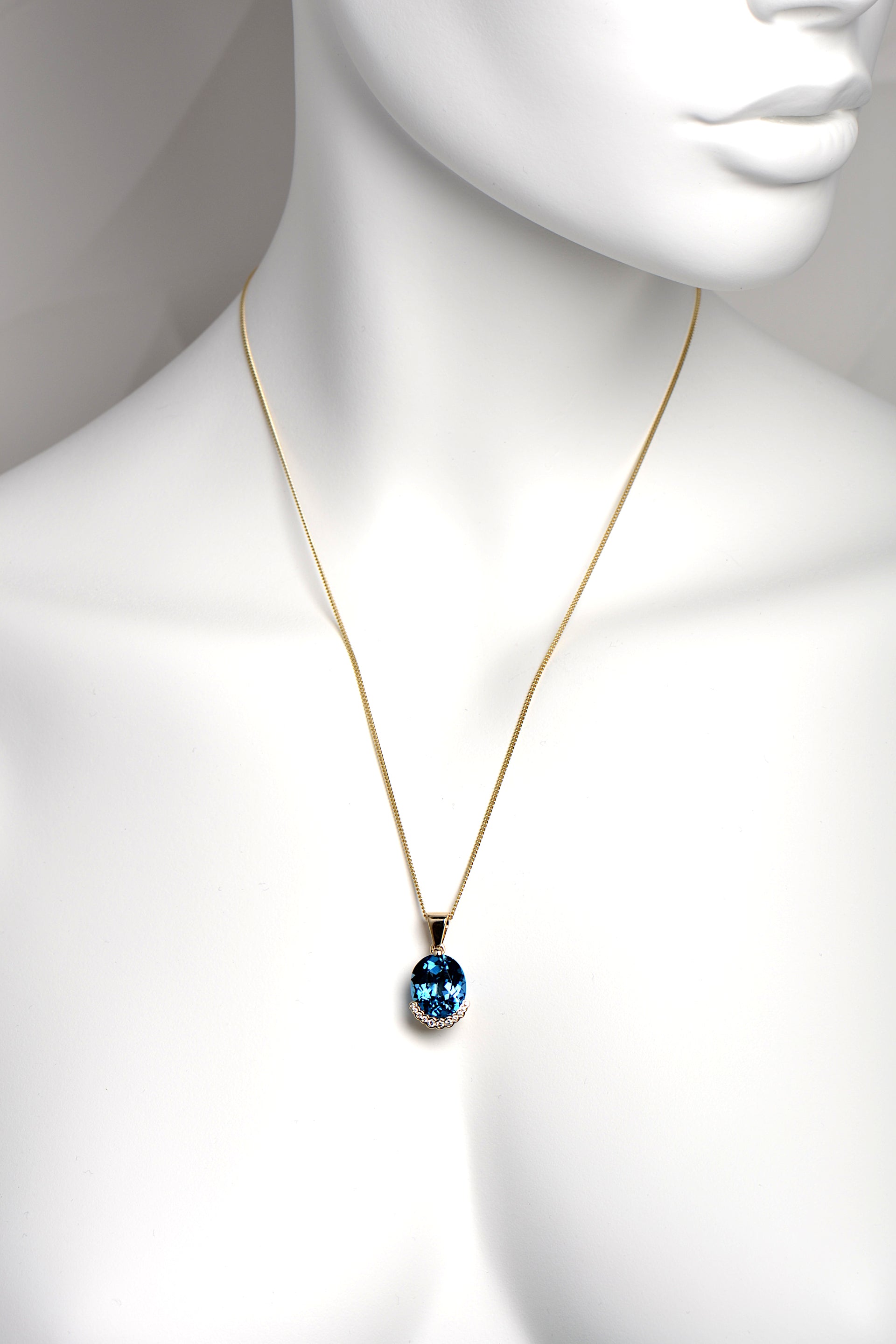 Large London blue Topaz and diamond yellow gold designer necklace
