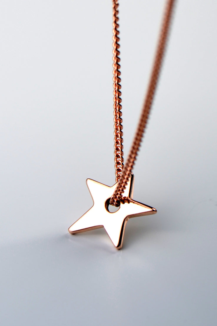 Falling star petite gold necklace