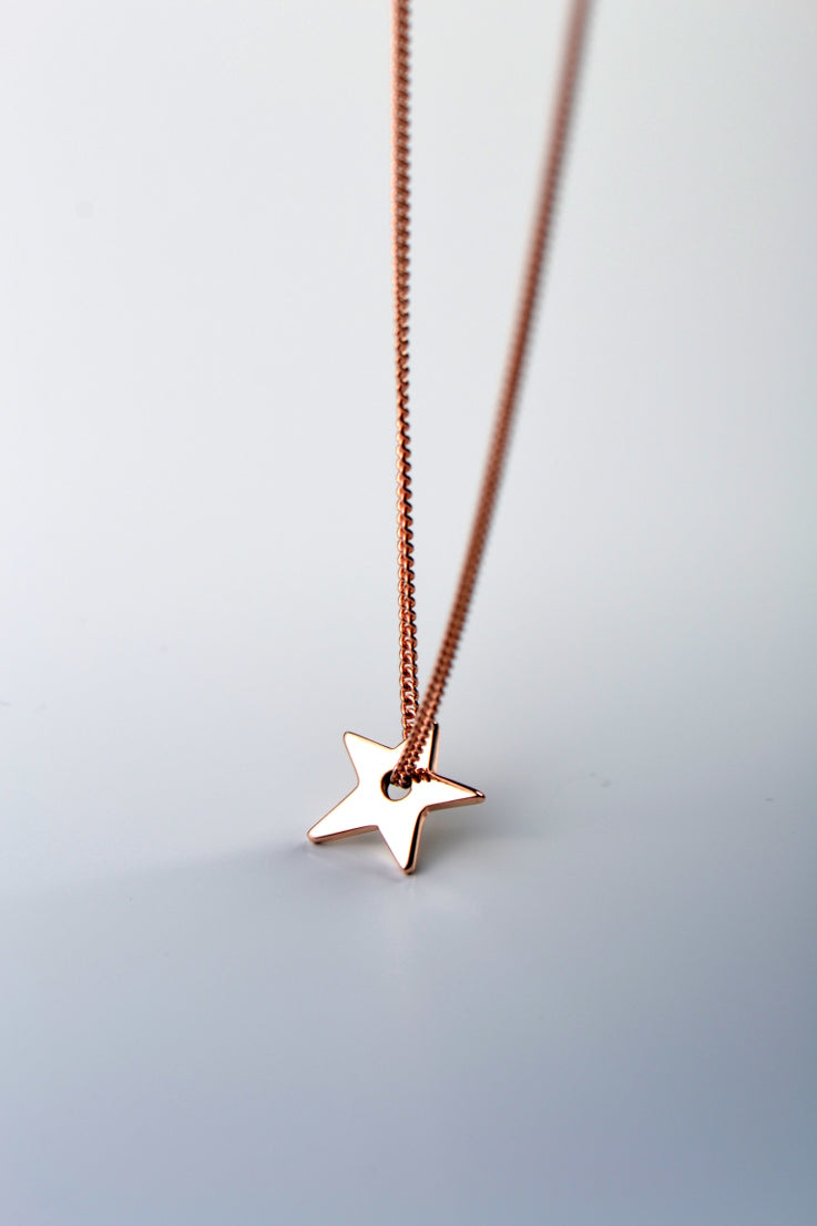 Falling star petite gold necklace