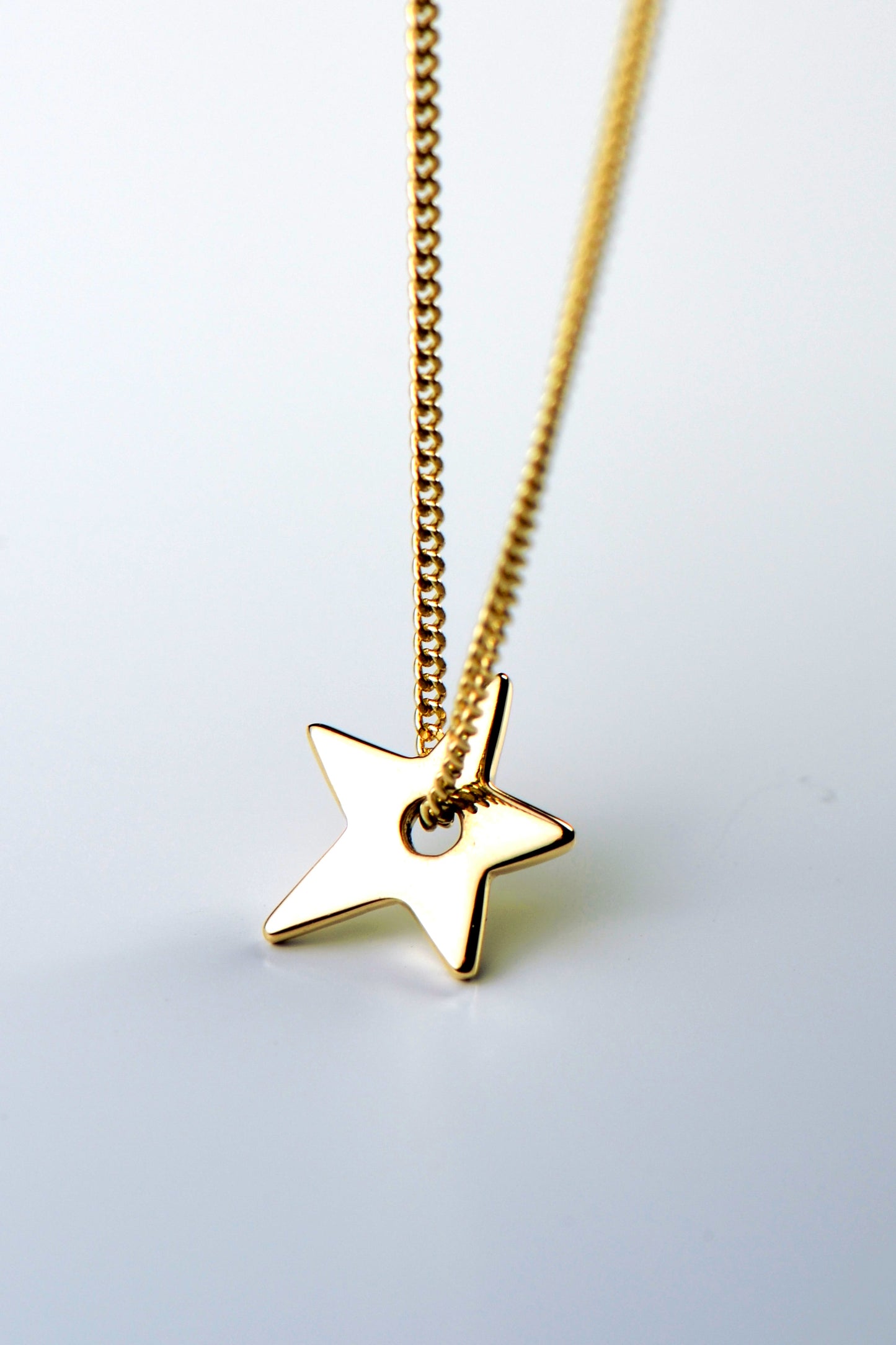 Falling star petite gold necklace