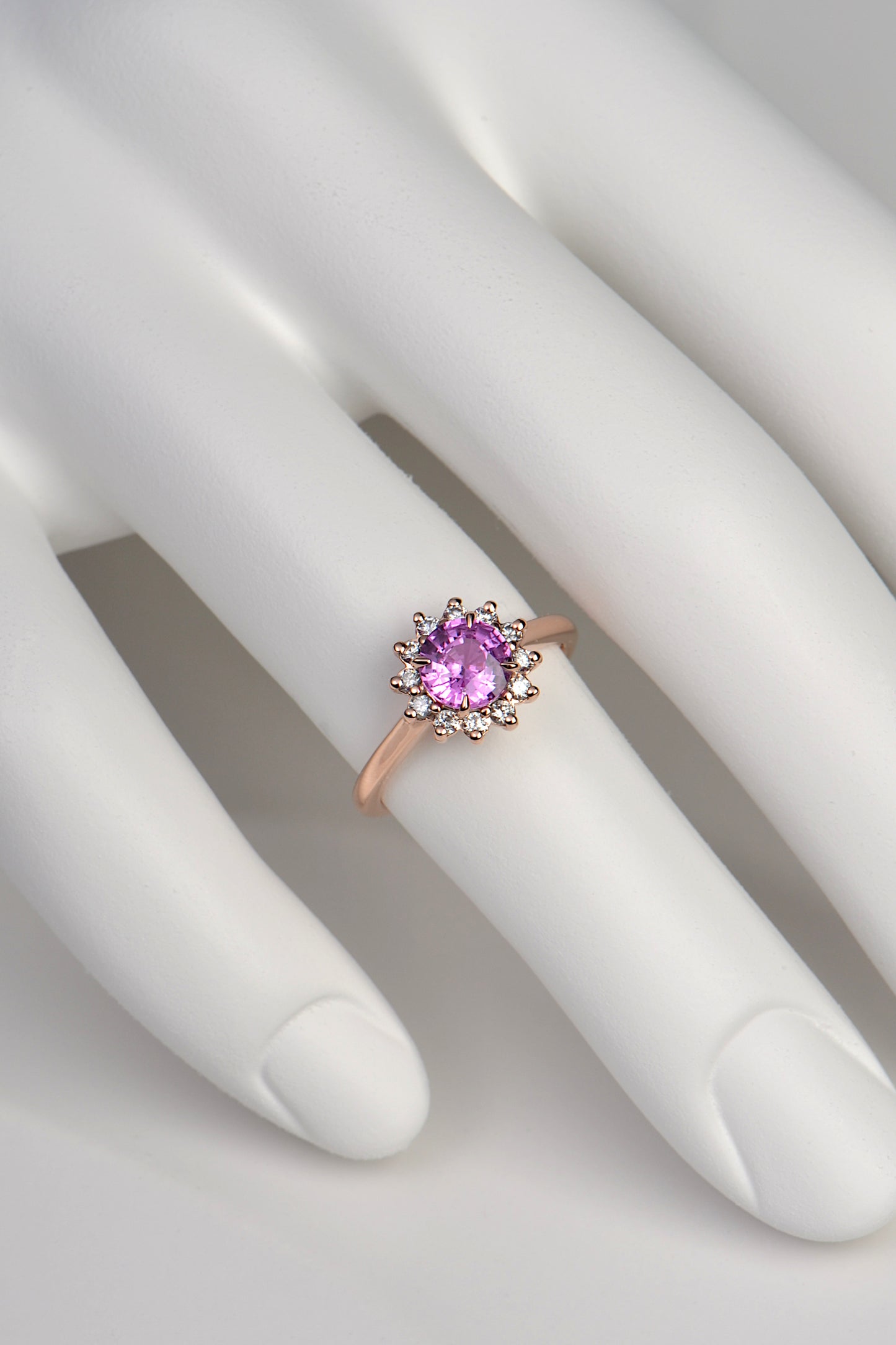 Rose gold flower ring with pink sapphire and diamond