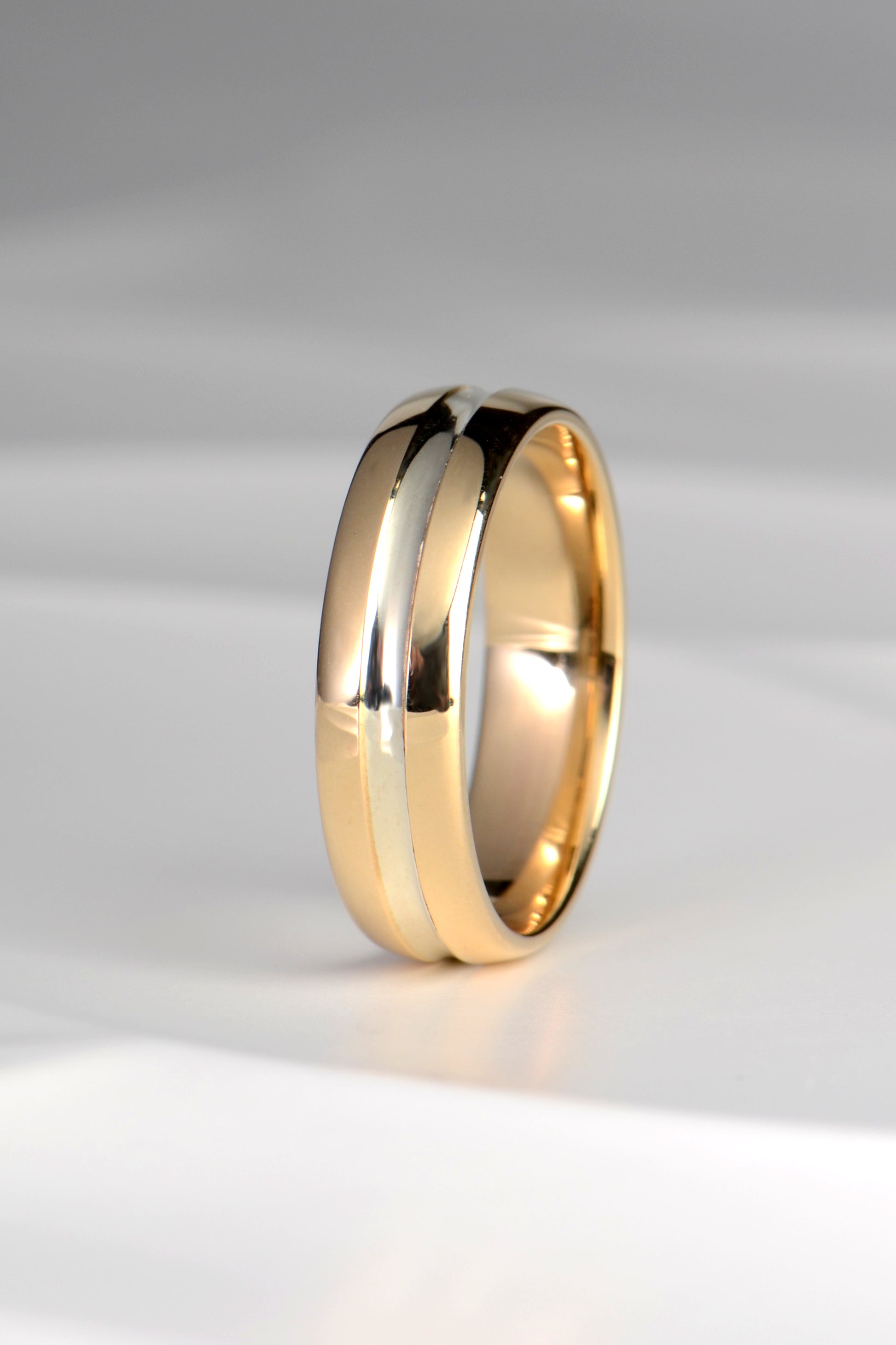 contemporary two tone gent's wedding ring made in the UK