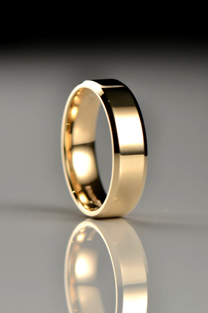 modern yellow gold gents wedding ring 6mm wide with chamfered edge detail