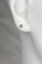round lab diamond white gold earrrings in model's ear to show size and scale - Christine Sadler