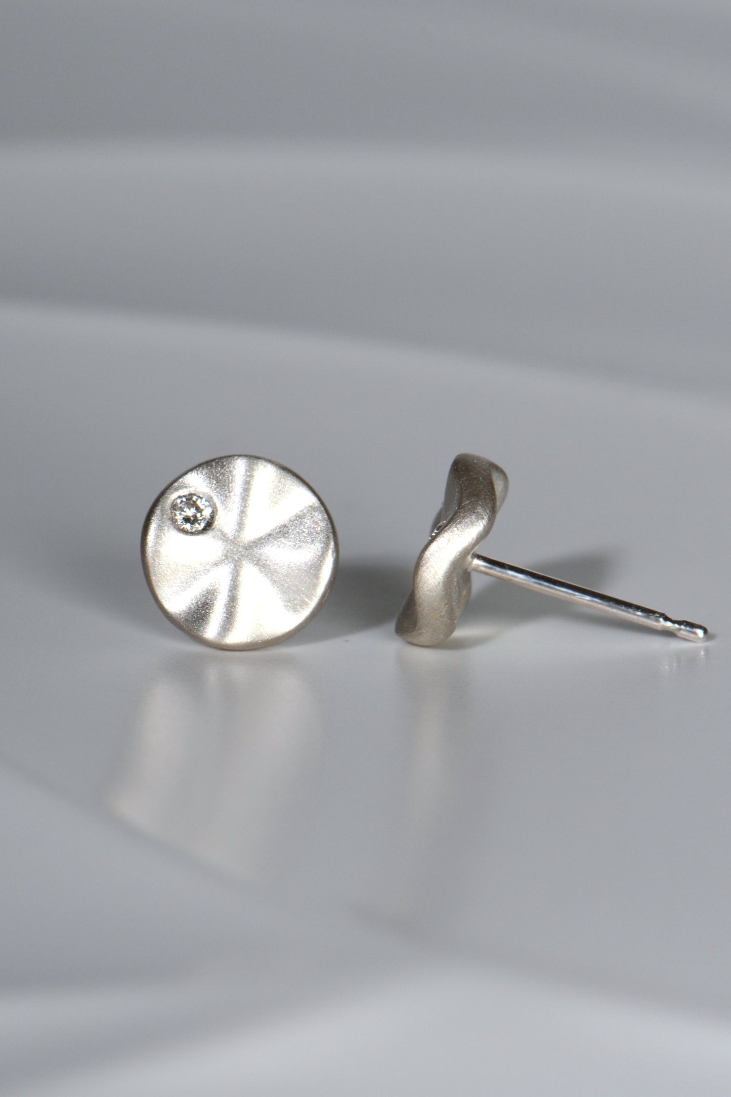 Ripple petite silver diamond earrings