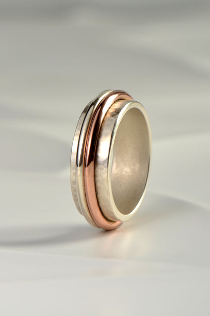 modern silver and rose gold ring for a man with a hammered texture by Christine Sadler
