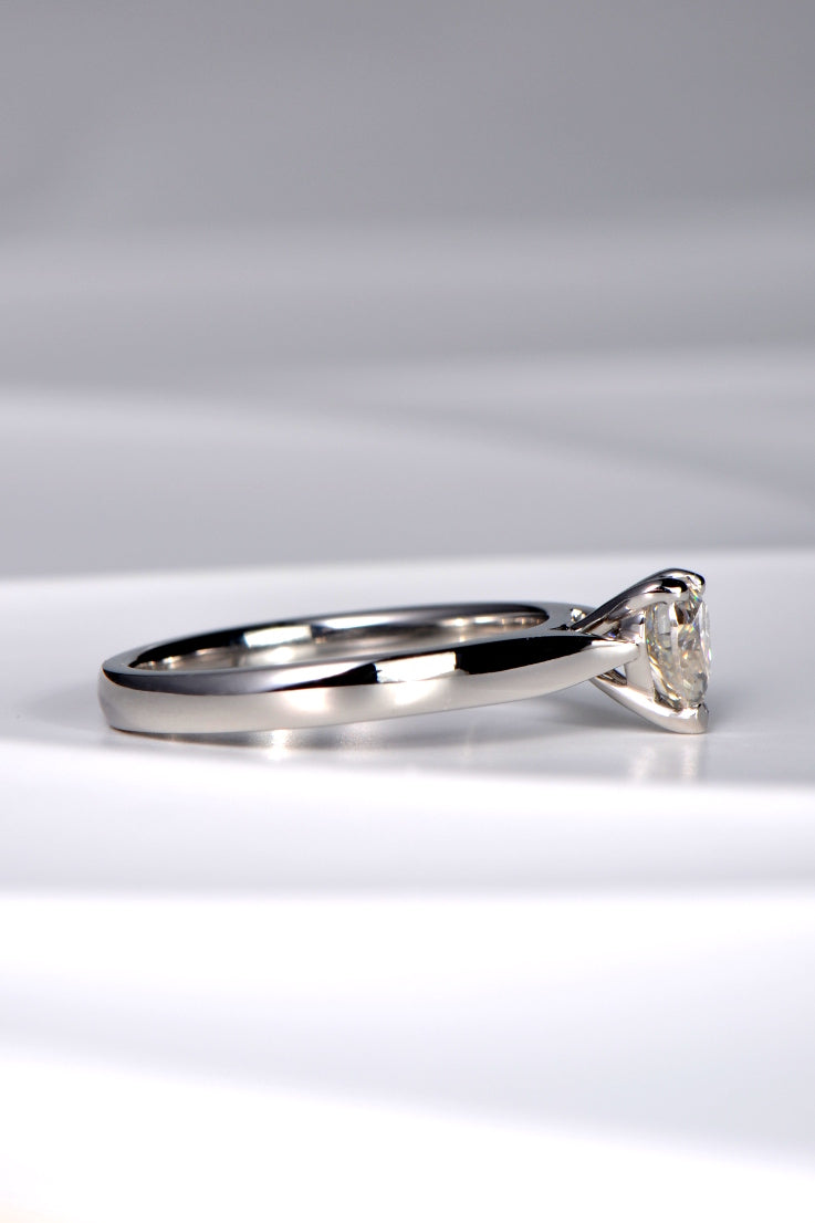 Platinum ring set with heart cut moissanite