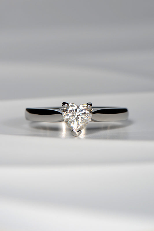 Platinum ring set with heart cut moissanite