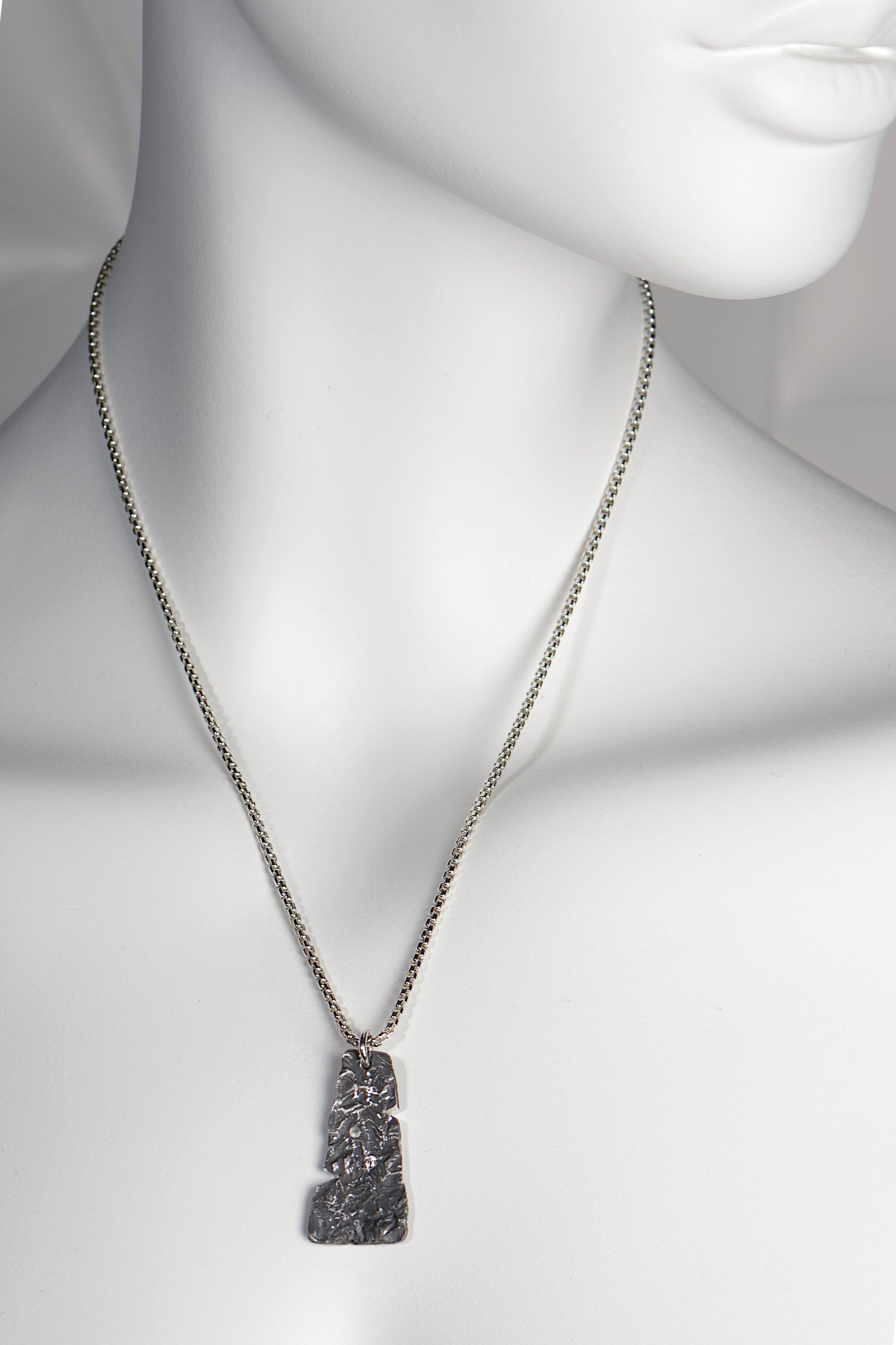 modern black textured silver necklace set with a diamond handmade by Christine Sadler from her Hero collection