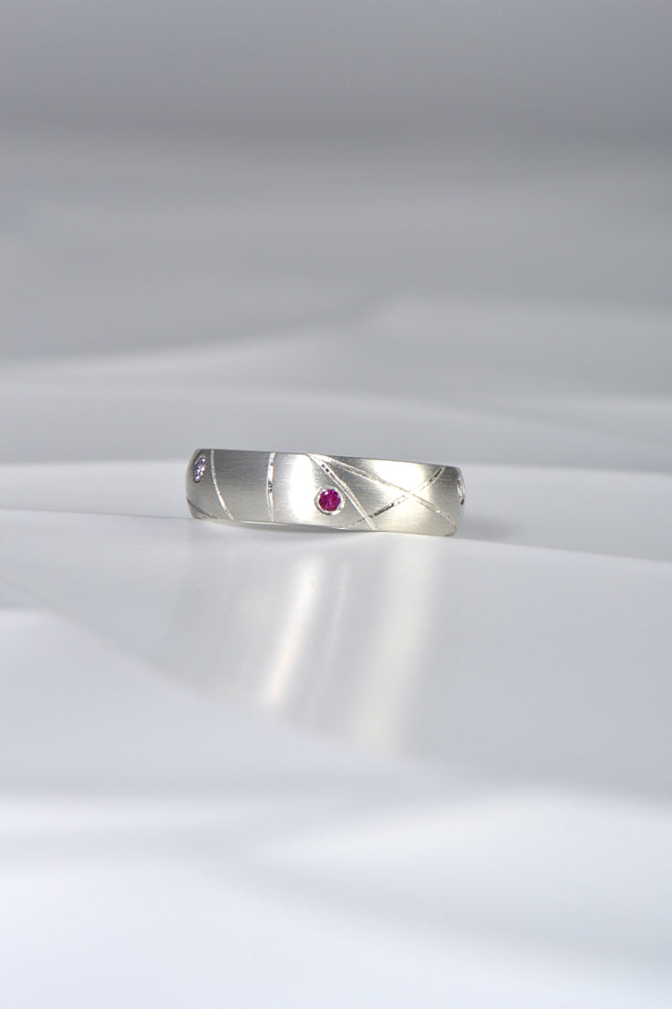 modern silver ring set with different coloured sapphires by Christine Sadler
