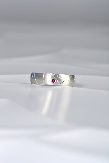 modern silver ring set with different coloured sapphires by Christine Sadler