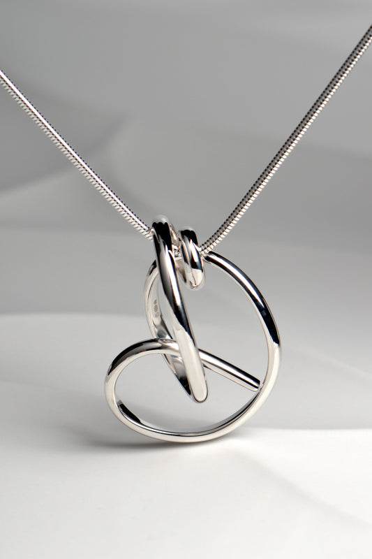 large real silver unique handmade silver knot necklace exclusively available from UK jewellery designer Christine Sadler