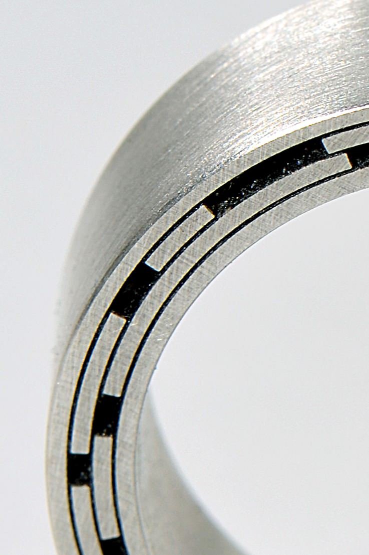 Black and silver limited edition silver designer ring inspired by star trails from jewellery designer Christine Sadler