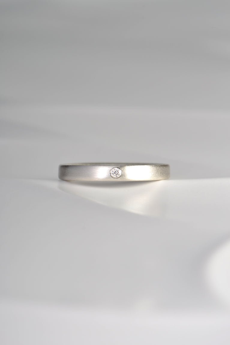 contemporary hand made sterling silver brushed finished ring with a diamond from Christine Sadler