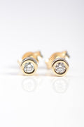 Handmade diamond earrings in yellow old from British jewellery designer Christine Sadler