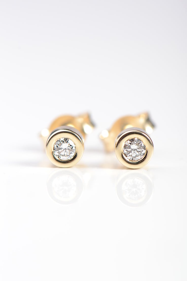 Handmade diamond earrings in yellow old from British jewellery designer Christine Sadler