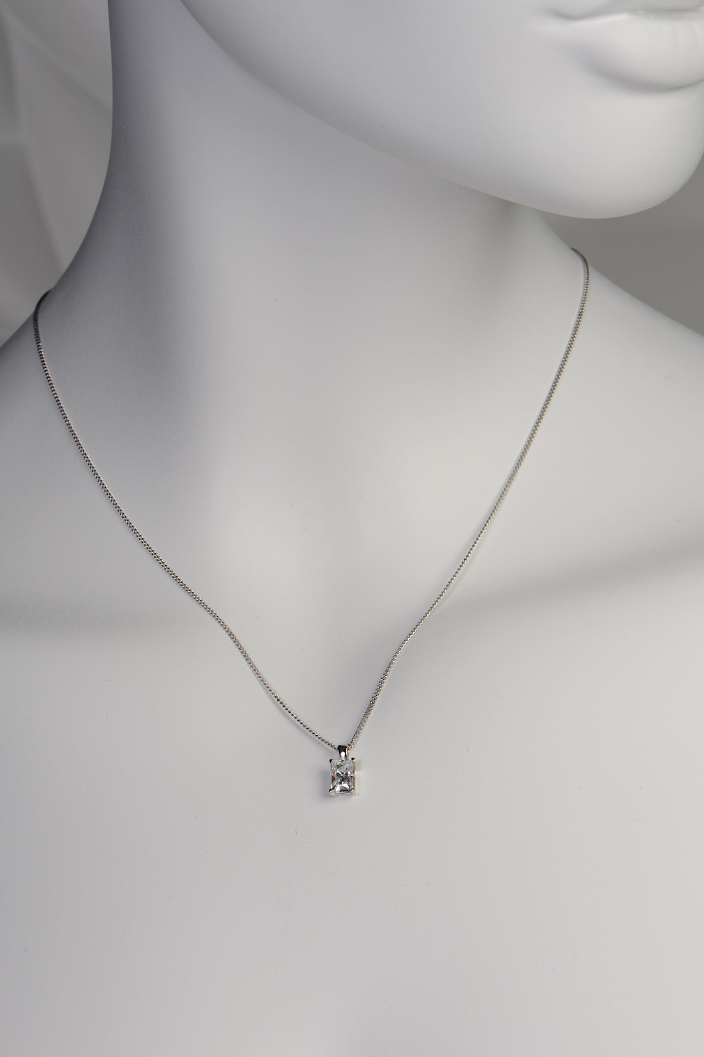 Radiant cut moissanite white gold pendant