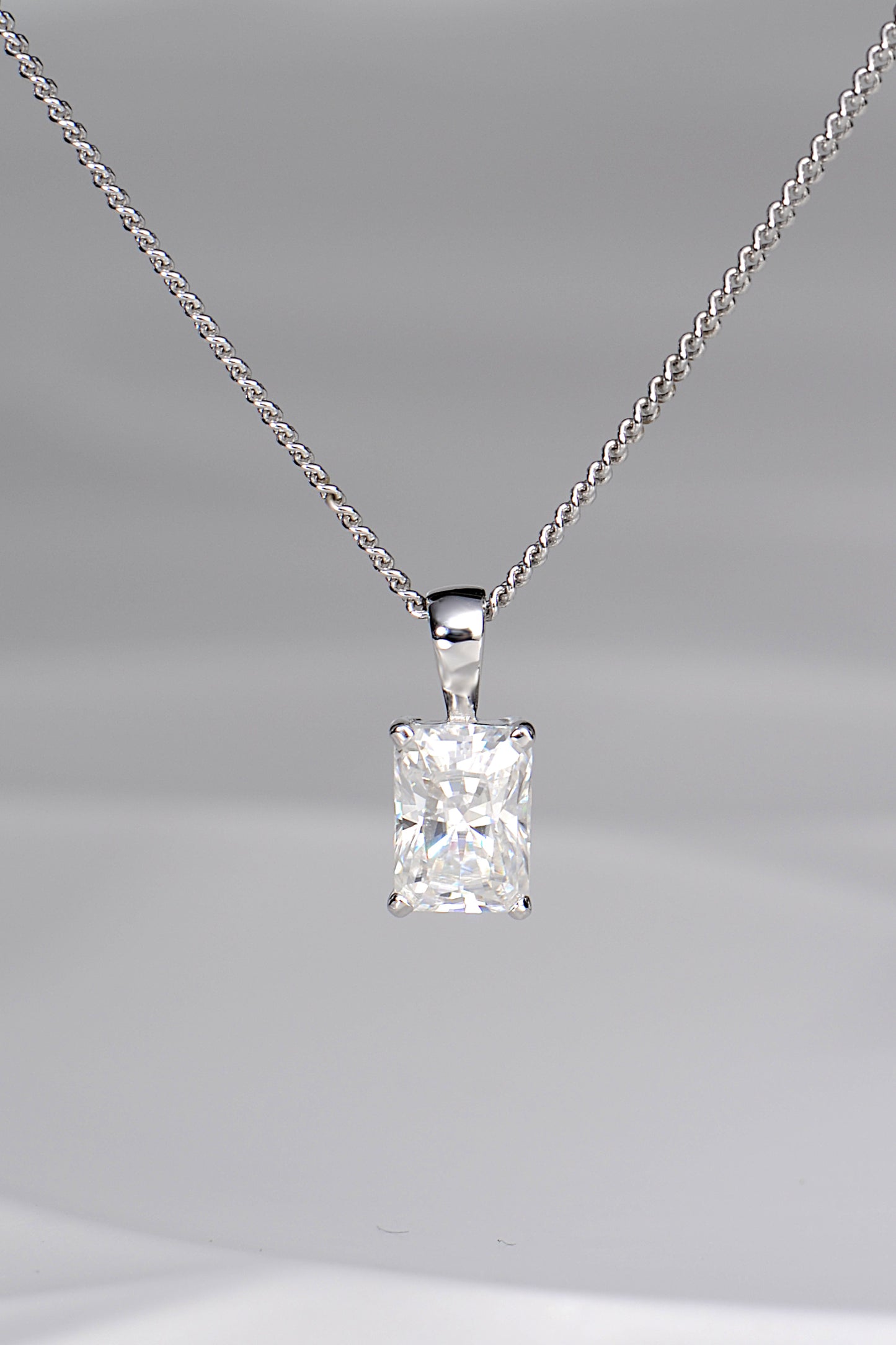 Radiant cut moissanite white gold pendant