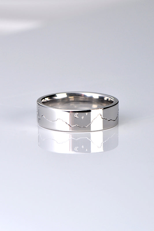handmade moon and stars mountain wedding ring that can be personalised with the mountain range of your choice