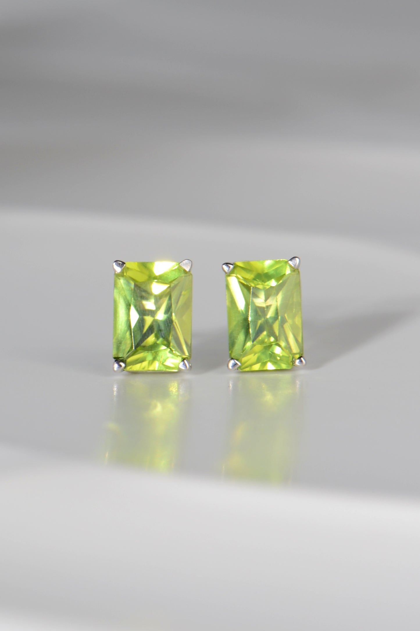 Radiant cut white gold peridot earrings