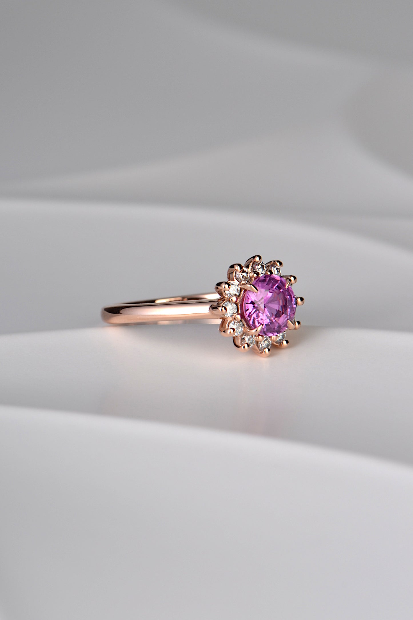 Rose gold flower ring with pink sapphire and diamond