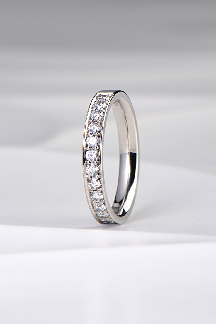 modern handmade diamond platinum wedding ring that can also be an eternity ring