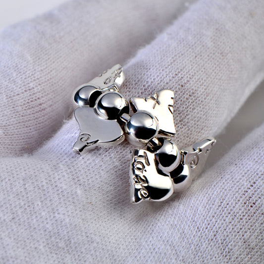 silver designer ring with moving parts and secret engraving