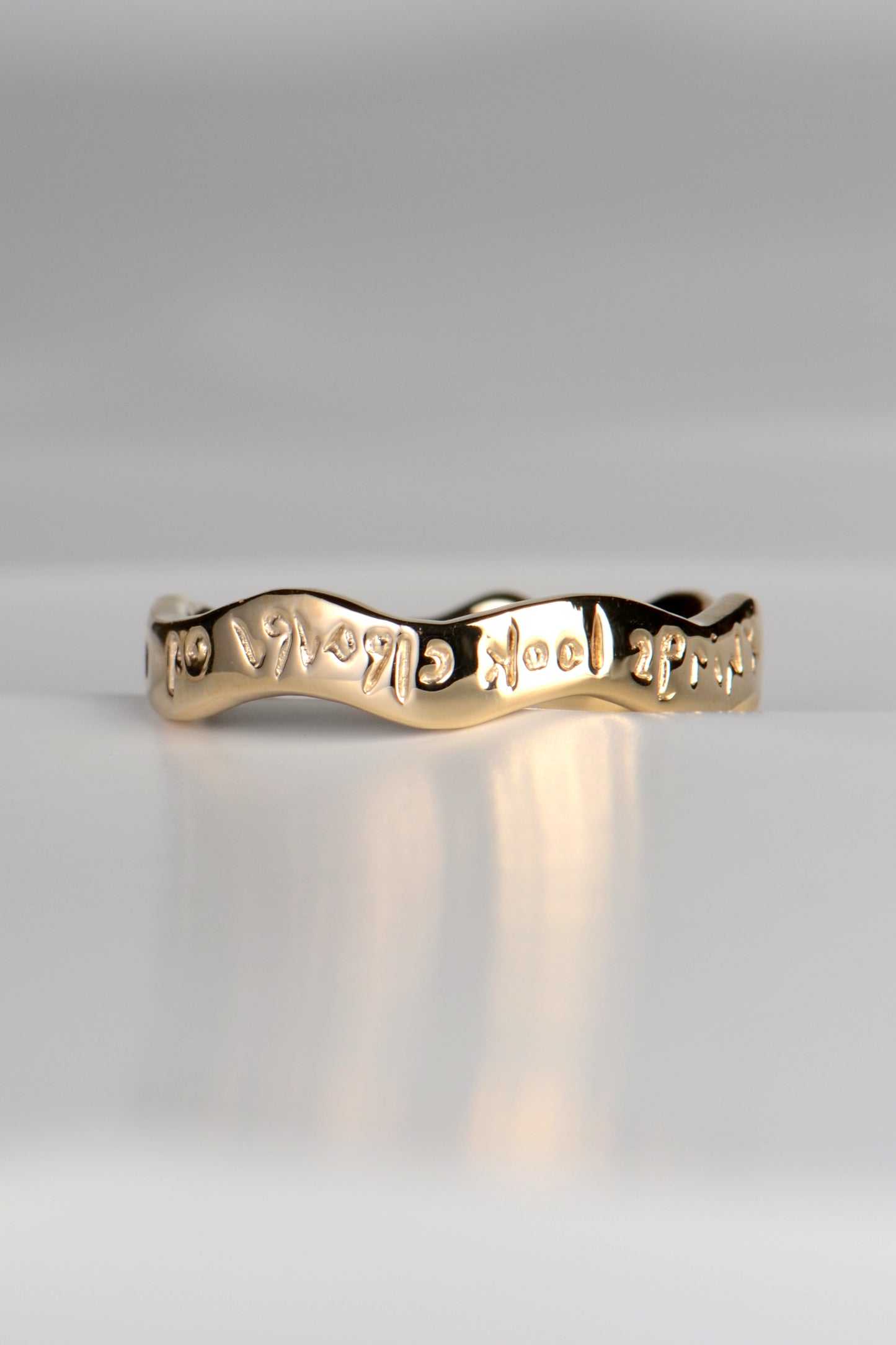 Gold reflection ring with diamond