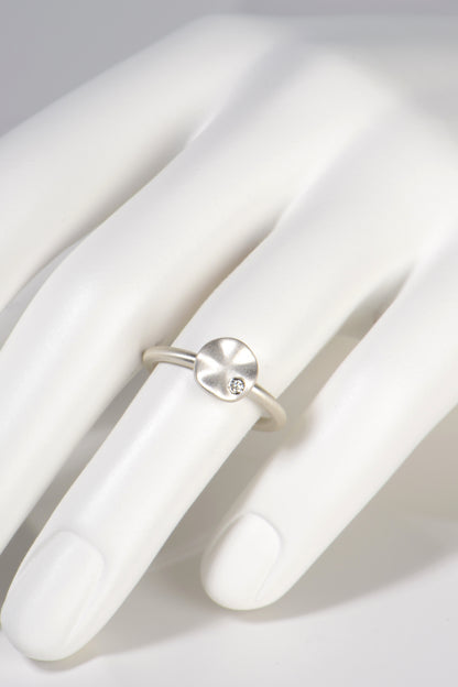 modern silver diamond ring by jewellery designer Christine Sadler inspired by the philosophy of the Ripple Effect