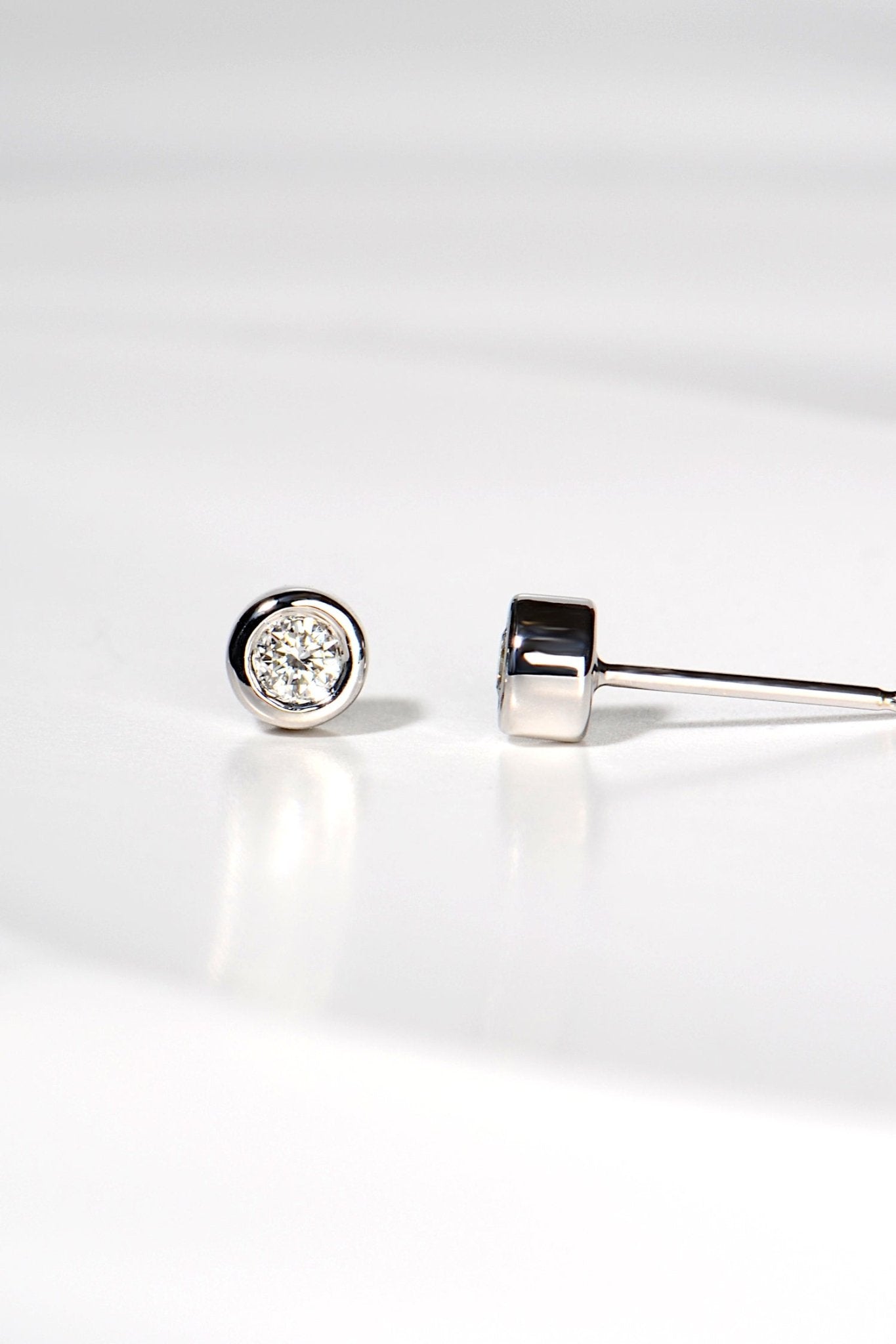 side view of 9ct white gold round lab diamond stud earrings - Christine Sadler