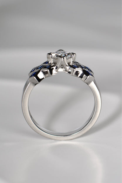 The diamond in the tartan ring is set higher than the sapphires so it looks like a rock rising out of a sapphire sea.This Scottish diamond ring design is available exclusively from Christine Sadler.